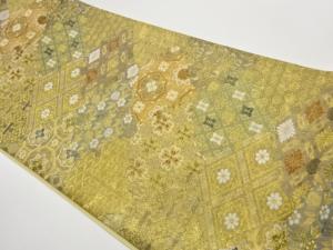 雪輪に菱・花々・古典柄模様織出し袋帯